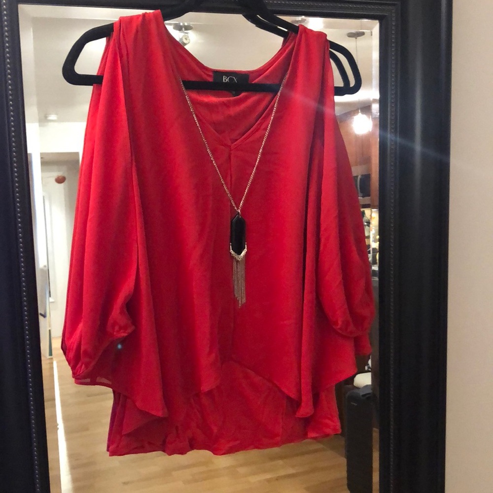 Red peek a boo sleeve top